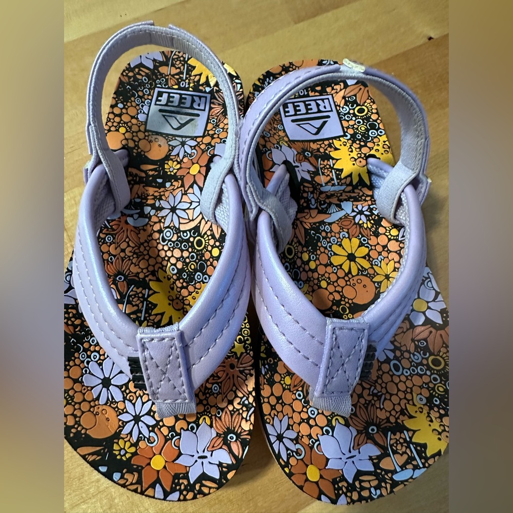 Reef Girls Sandals.  Excellent condition
Brand New without tags